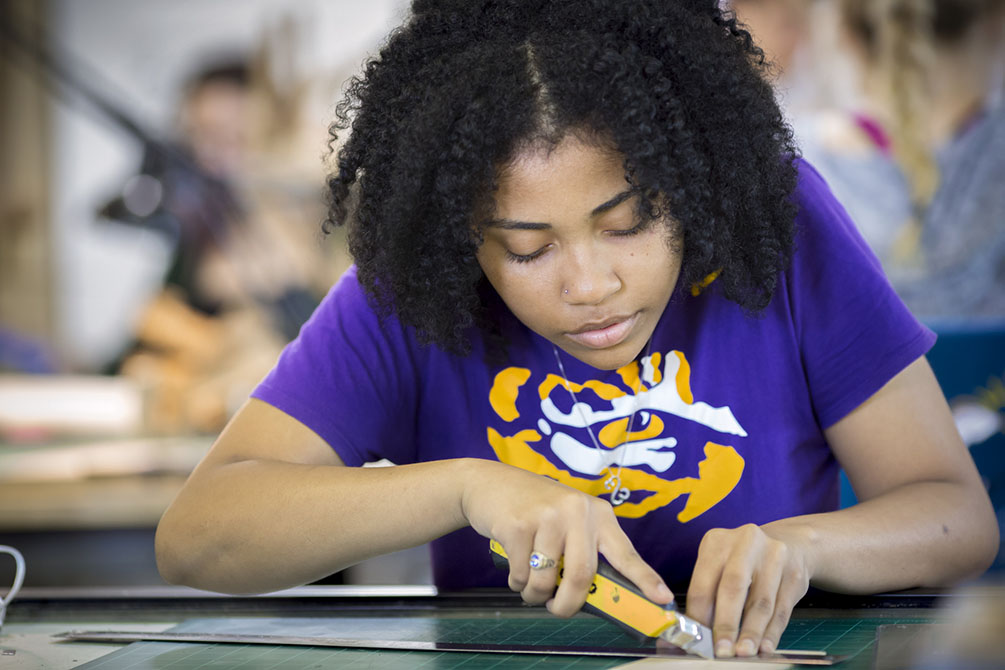 An LSU student works on a project in an School of Architecture class.