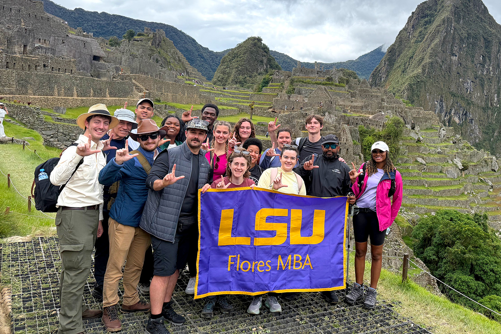 Students at Machu Picchu holding an LSU flag