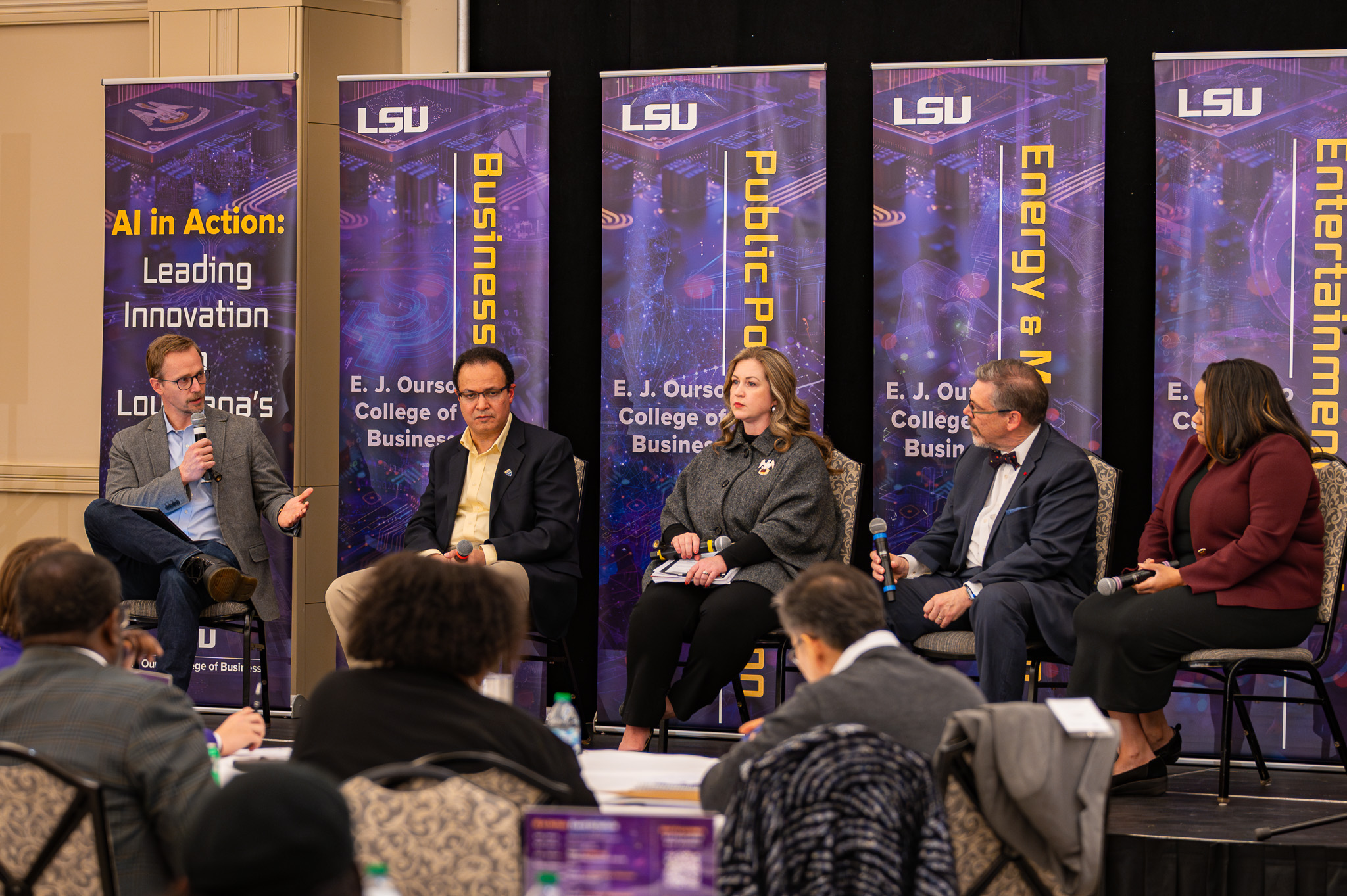 Members of the AI in Public Policy and Education panel hold a discussion at the AI in Action Symposium on February 21, 2025.