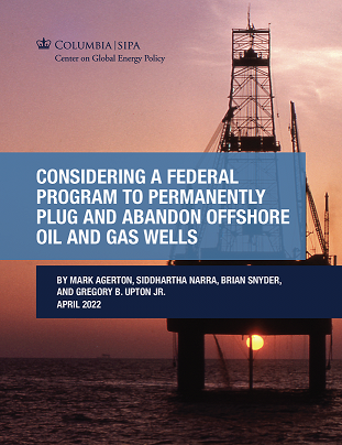 cover of report showing oil well in sunset
