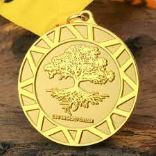 Gold medal with a tree for Engaged Citizens.