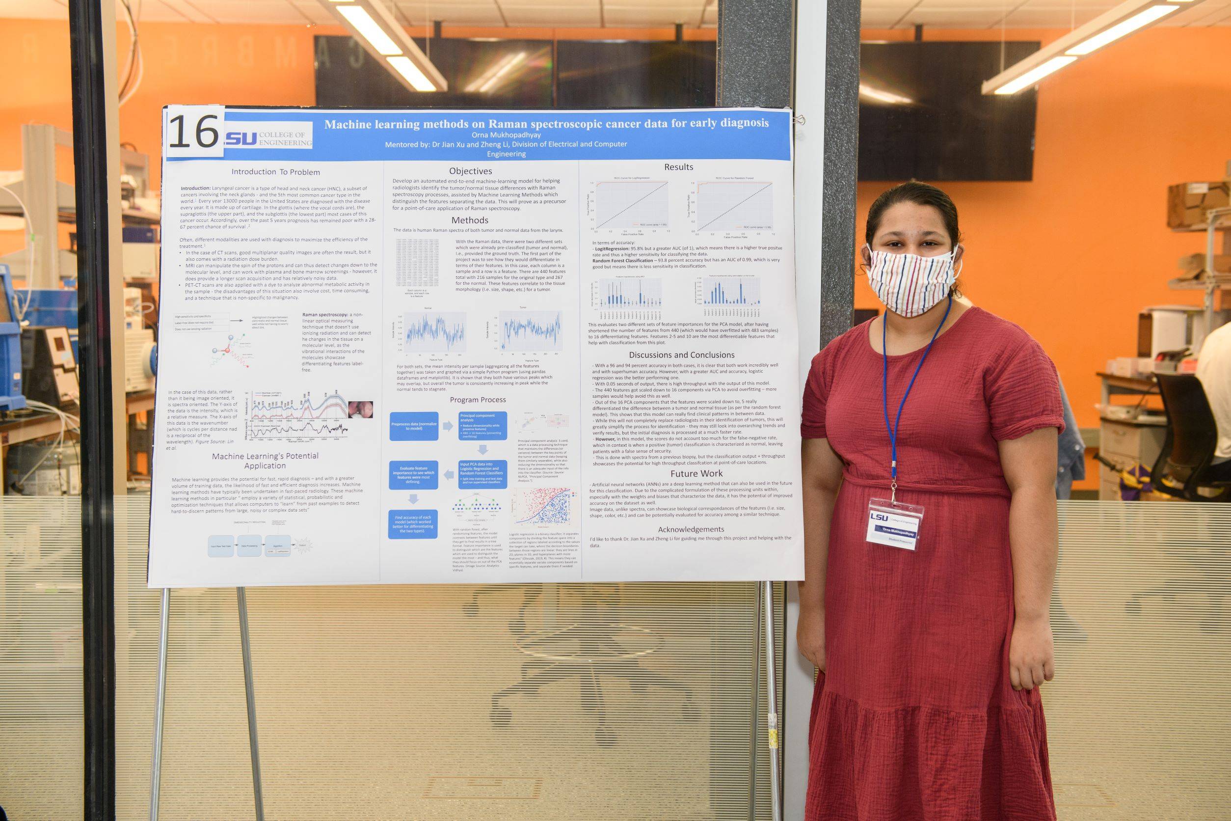 Orna Mukhopadhyay posing with poster project