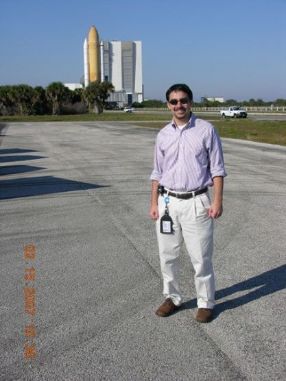 Dardar posing outside of NASA