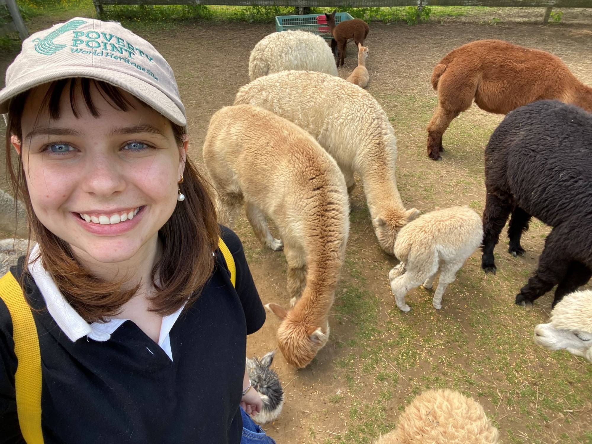 Aja Palermo taking selfie with alpaca