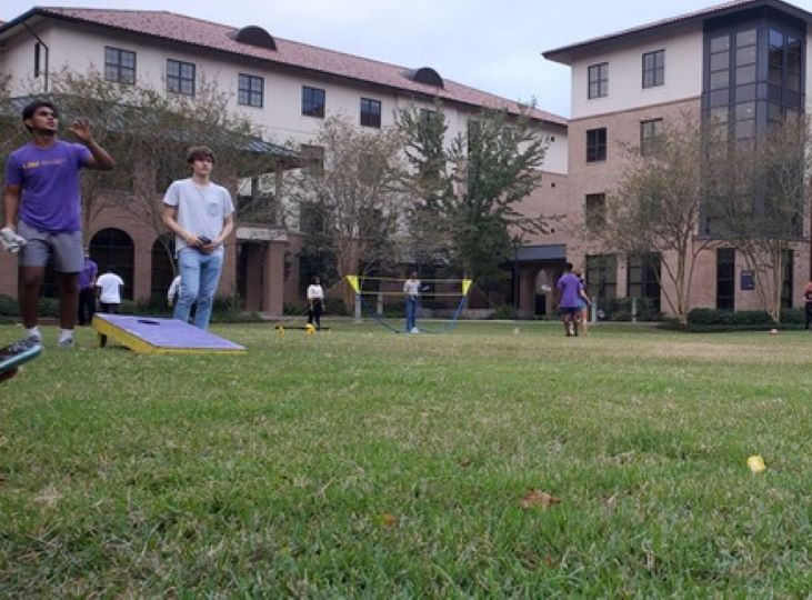 students playing games outside north hall