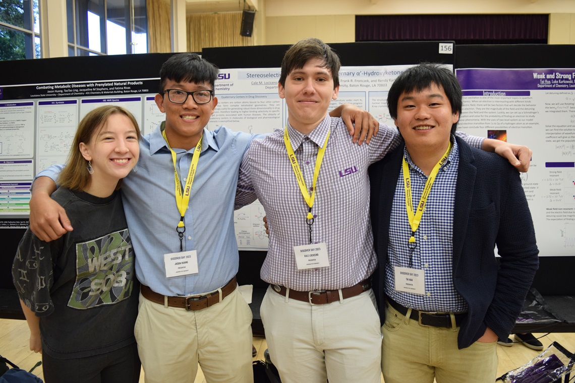 Four students posingn for a group photo