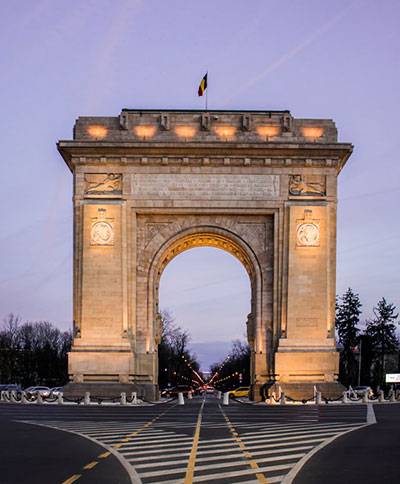 Photo of the Arcul de Triumf in Bucharest, Romania by Nicole Baster on Unsplash.