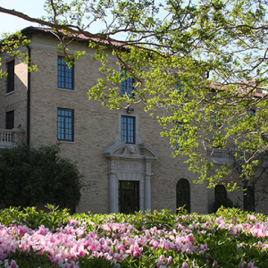 Photo of HP Long Fieldhouse with azalea's in bloom