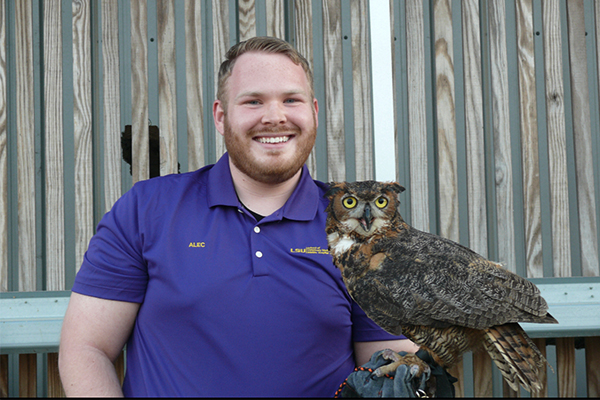 Alec Filson with Great Horned Owl