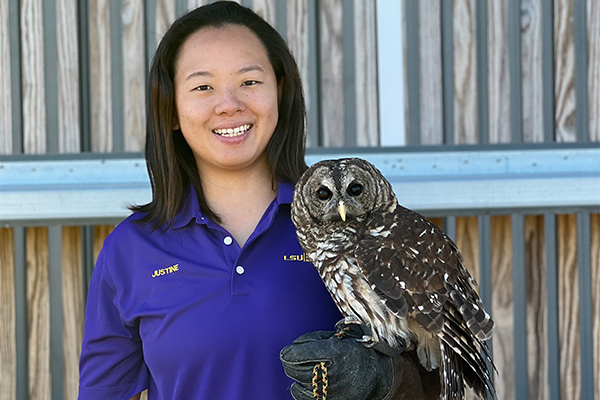 Justine Sheu with barred owl